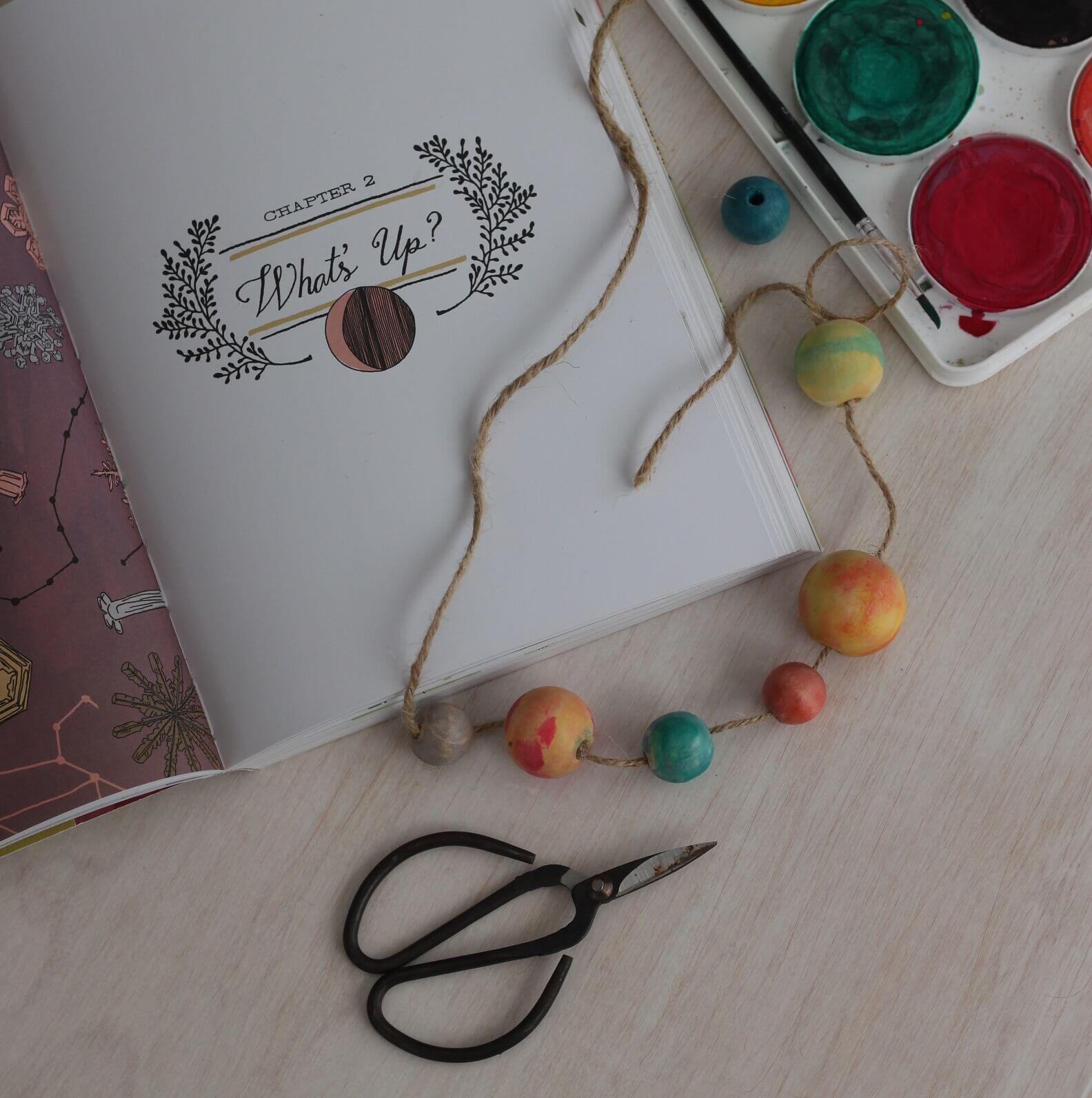 Solar System Necklace and Bracelet Are a Perfect Pair of Planet Jewelry